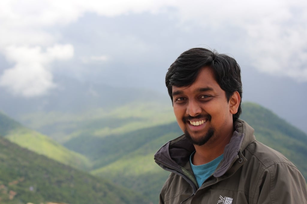 Headshot_Abishek Harihar_credit-Joseph_Vattakaven Voices of Nature Podcast: Dr. Abishek Harihar Takes Us Into the World of Tigers